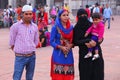 Indian family standing at Jama Masjid in Delhi, India