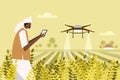 An Indian farmer using a drone for spraying fertiliser in the agricultural field