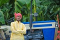 indian farmer portrait with tractor