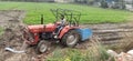 Indian Farmer in your land with tractor