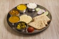 Indian Fasting cuisine Upwas items Thali complere meal for vrat ekadashi.Upawas thali meal with Rajgira puri, paratha,shakarkand