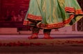 Indian female artist performing indian classical dance kathak