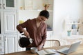 Indian female freelancer take pause to make cup of coffee