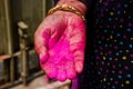 an indian female hand holding colorful abir or gulal powder on the occasion of playing holi in India Royalty Free Stock Photo