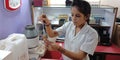 an indian female lab technician doing experiment at laboratory in india aug 2019 Royalty Free Stock Photo