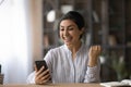 Indian female student receive phone message about winning science fair