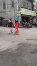 Indian Female walking in the shopping market street