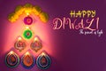 Indian festival Diwali, Diya oil lamps lit on colorful rangoli. Hindu traditional. Happy Deepavali. Copy space for text Royalty Free Stock Photo