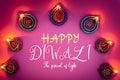 Indian festival Diwali, Diya oil lamps lit on colorful rangoli. Hindu traditional. Happy Deepavali. Copy space for text Royalty Free Stock Photo