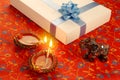 Indian Festival Diwali Diya with Gift Box and ribbon Royalty Free Stock Photo