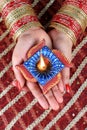 Indian Festival Diwali Diya Lamp Light in Female Hand Royalty Free Stock Photo