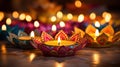 Indian festival Diwali, Diya oil lamps lit on colorful rangoli. Hindu traditional festival of lights. Generative AI Royalty Free Stock Photo