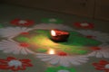 Indian festival diwali vibes with glowing diya and rangoli