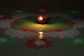 Indian festival diwali vibes with glowing diya and rangoli