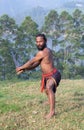 Indian fighter doing exercises with sword