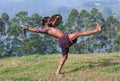 Indian fighter performing Kalaripayattu marital art demonstration in Kerala, India