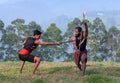 Indian fighters performing Kalaripayattu Marital art demonstration in Kerala, India