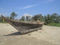 Indian fisherman boat with equipment drying on the sea coast