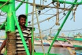 Indian fisherman on his boat in Kanyakumari, India