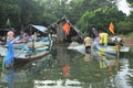 Indian fishermen preparing fishing nets for upcoming voyage