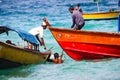 Indian fishermen on their boats in the ocean