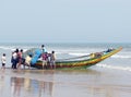 Indian fishermen and traditional boat