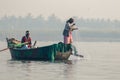 Indian fishing in a lake