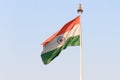 Indian flag flying against blue sky background. The National Flag of India is a horizontal rectangular tricolor saffron, white Royalty Free Stock Photo