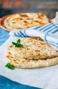 Herb stuffed paratha on a baking paper