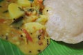 Indian Food Boori With Masala On Coconut Tree Leaf