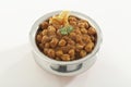 Indian Food- Chana Masala in stainless steel pot.