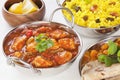 Indian Food Chicken Jalfrezi Curry and Yellow Rice Pillau Royalty Free Stock Photo