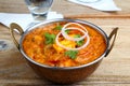 Indian Food or Indian Curry in a copper brass serving bowl