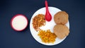 Indian food deep fried Puri Bhaji or Aloo ki Sabji, Potatoes and kheer Royalty Free Stock Photo