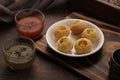 Indian Food Snacks Gol Gappe or Pani Puri or Puchka Water Balls in a White Plate Royalty Free Stock Photo