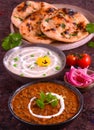 Indian food - tandoori roti methi malai matar and dal makhni