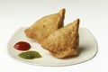 Indian Food:traditional indian spicy crispy fried Punjabi Samosa.