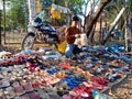 indian footwear street shop selling by Asian man in India January 2020 Royalty Free Stock Photo