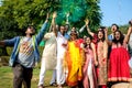 Indian Friends Playing With Color during Holi Indian Festival