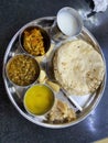 Indian full thali with various foods items for lunch or dinner