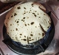 indian fulla roti on gas chulha