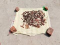 Indian garam masala ingrdients on cloth, in sunlight for drying