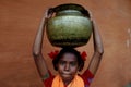 Indian girl carrying water