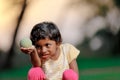 Indian girl child playing with ball Royalty Free Stock Photo