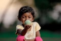 Indian girl child playing with ball Royalty Free Stock Photo