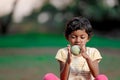 Indian girl child playing with ball Royalty Free Stock Photo