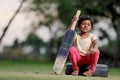 Indian girl child playing cricket Royalty Free Stock Photo