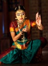 Indian girl dancing Bharat Natyam dance