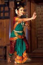 Indian girl dancing Bharat Natyam dance