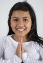 Indian Girl giving the traditional welcome sign. Royalty Free Stock Photo